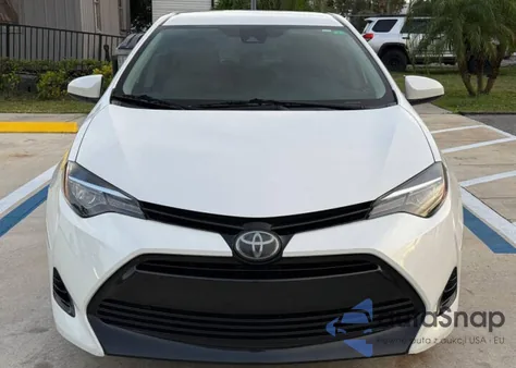 2018 Toyota Corolla L z USA, uszkodzony, nr VIN 5YFBURHE4JP828XXX